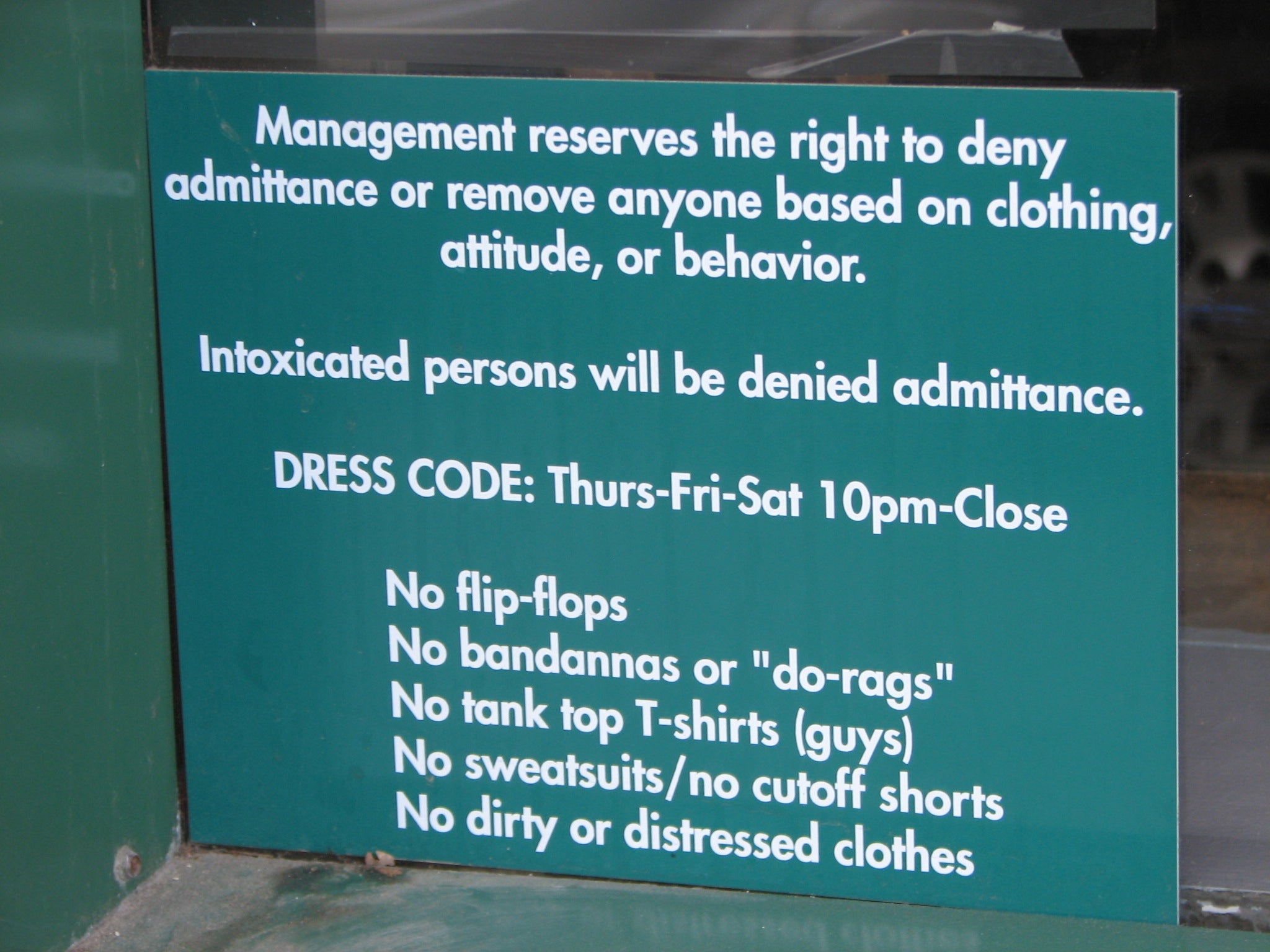 A sign outside a bar